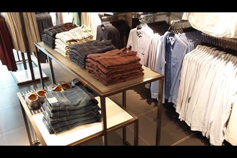 Multi-level display tables break up the linear format of the store